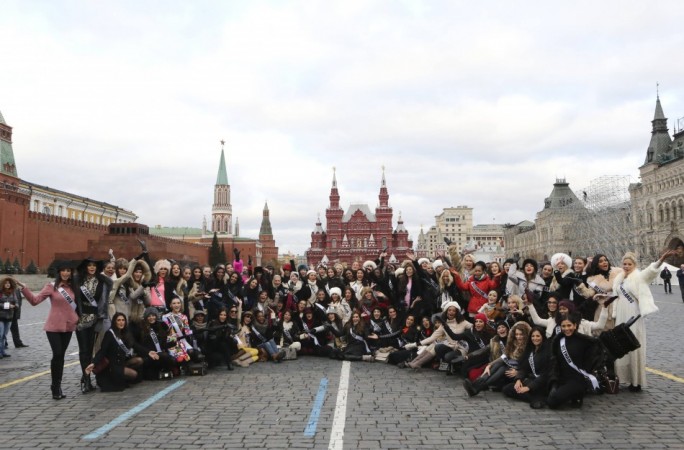 Contestants in the forthcoming Miss Universe pose for photographers during a photo opportunity in Moscow's Red Square