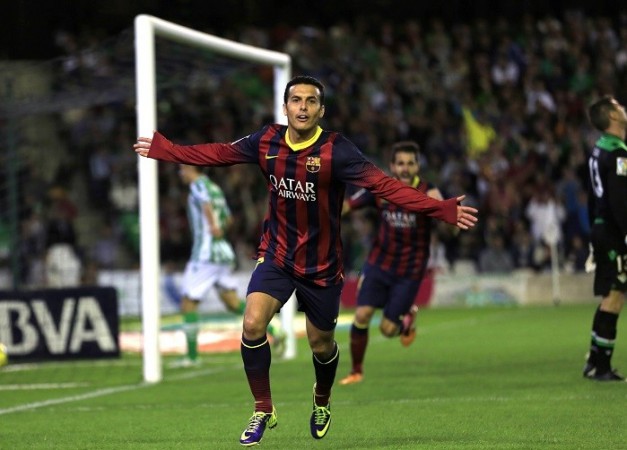 Will Pedro be joining Cesc Fabregas (back) at Chelsea next season? Pedro Barcelona