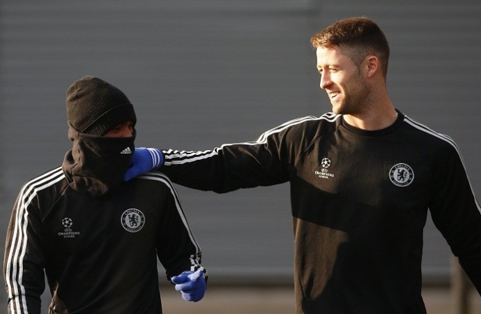 Chelsea defender Ashley Cole and Gary Cahill have a word during a training session on the eve of their Champions League match against Steaua Bucharest, December 10. Reuters Chelsea Gary Cahill Ashley Cole