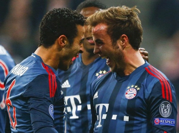 Bayern Munich's Thiago Alcantara and Mario Gotze celebrate a goal against Manchester City, December 10. Reuters Bayern Munich Thiago Gotze