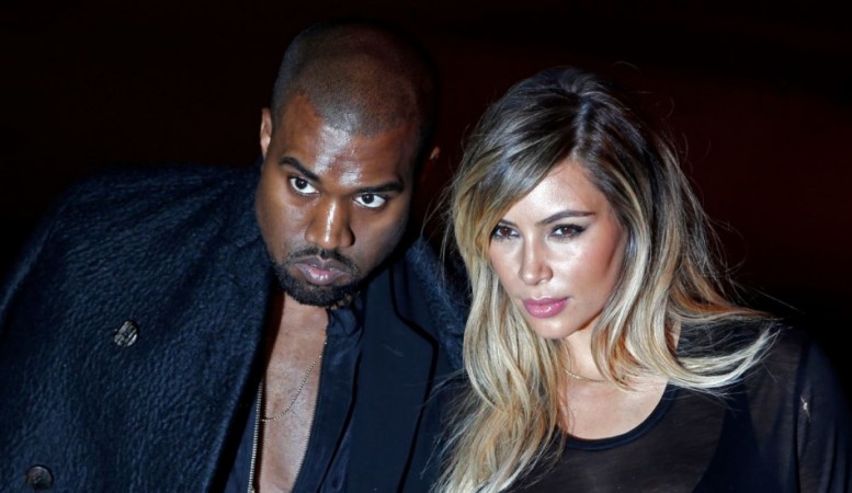 American television personality Kim Kardashian reportedly wants a wedding dress similar to that of Kate Middleton. Here seen with Kanye West (Reuters)