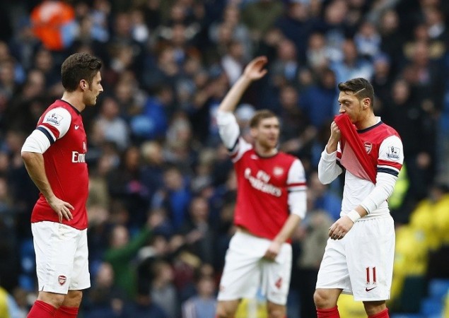Arsenal will play the strongest side in the Champions League in Bayern Munich, in a replay of last season's last 16 tie. Reuters Arsenal Giroud Ozil