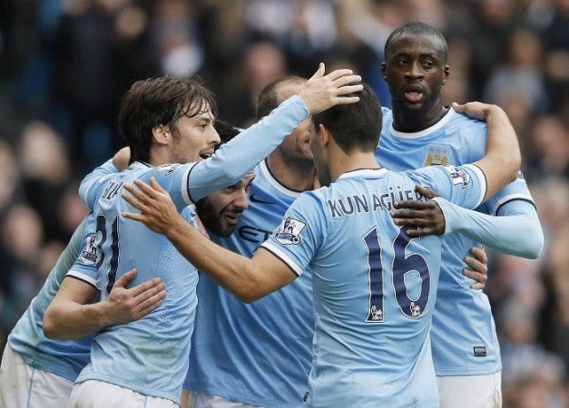 Manchester City face the unenvious task of toppling Barcelona. Reuters Manchester City Yaya Toure David Silva