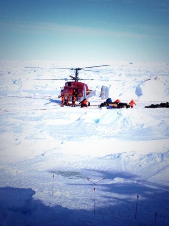 The Chinese helicopter taking the stranded scientists and crew members