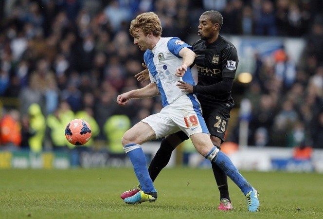 Blackburn's Chris Taylor and Manchester City midfielder Fernandinho fight for possession during their FA Cup third round game, January 4. Reuters Blackburn Chris Taylor Fernandinho Manchester City
