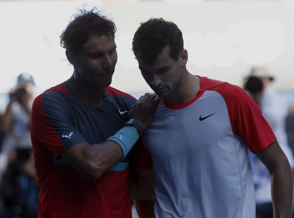 Rafael Nadal consoles Grigor Dimitrov after their quarterfinal match at the Australian Open, 22 January. Reuters Rafael Nadal Grigor Dimitrov Australian Open