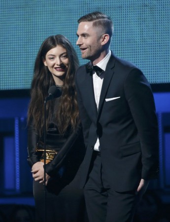 Lorde is accompanied by producer Little after the won the award for Song of the Year for Lorde