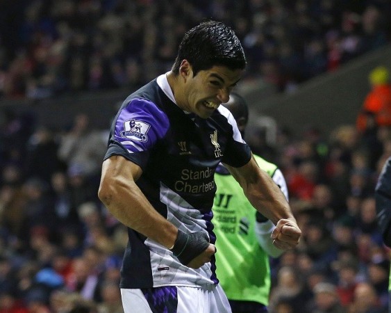 Liverpool forward Luis Suarez celebrates after scoring against Stoke in the English Premier League, 12 January. Reuters Luis Suarez Liverpool
