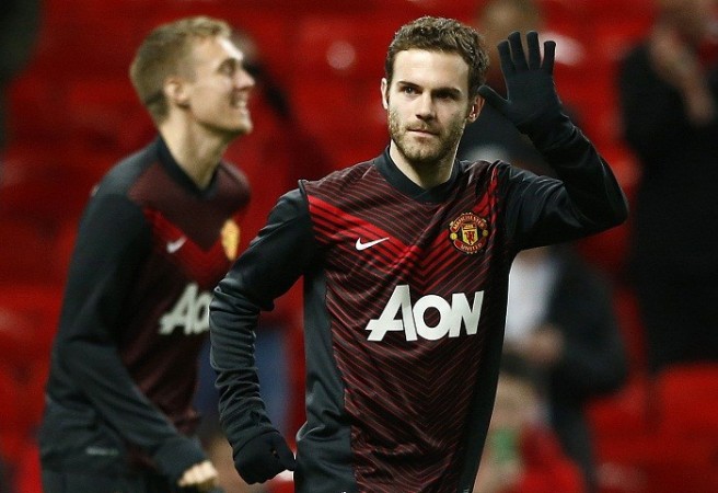 Juan Mata warms up ahead of Manchester United's clash against Cardiff, 28 January. Reuters Juan Mata Manchester United