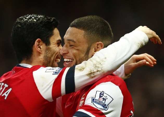 Arsenal midfielder Alex Oxlade-Chamberlain celebrates with teammate Mikel Arteta after scoring against Crystal Palace in the English Premier League, 2 February. Reuters Alex Oxlade-Chamberlain Mikel Arteta Arsenal