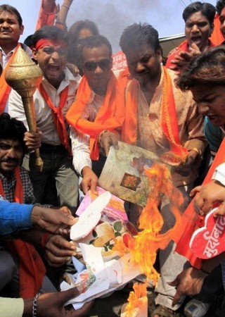 Activists of Bajrang Dal burn greeting cards shout slogans during protest against Valentine's Day celebrations in Bhopal/Reuters File Activists of Bajrang Dal burn greeting cards shout slogans during protest against Valentine's Day celebrations in Bhopal/Reuters File