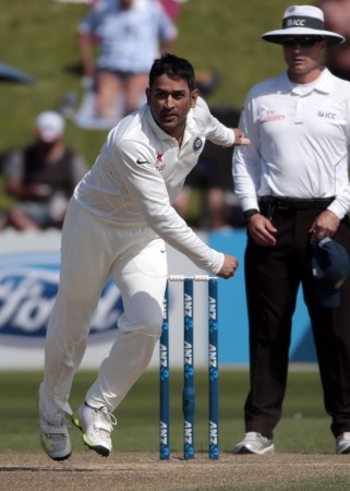 MS Dhoni rolls his arm over in Wellington against New Zealand , 16 February. Reuters. MS Dhoni