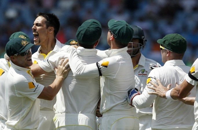 Australia fast bowler Mitchell Johnson celebrates with his teammates after dismissing South Africa skipper Graeme Smith in the first Test, 13 February. Reuters Mitchell Johnson Australia David Warner