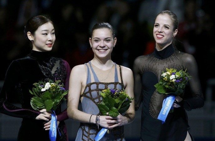 From left to right: Yuna Kim (silver), Adelina Sotnikova (gold), Caroline Kostner (bronze), 20 February. Reuters. sochi 2014
