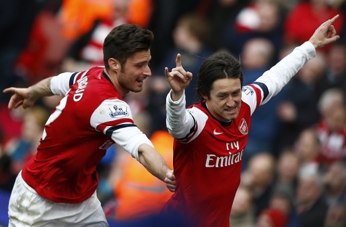 Tomas Rosicky celebrates with Olivier Giroud after scoring against Sunderland in the English Premier League, 22 February. Reuters Tomas Rosicky Olivier Giroud Arsenal