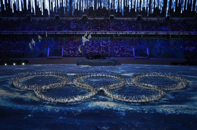 Performers form the actual Olympic rings during the closing ceremony for the 2014 Sochi Winter Olympics, February 23. Reuters Sochi 2014