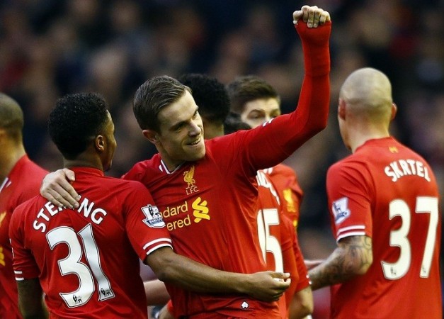 Liverpool midfielder Jordan Henderson celebrates with teammates after scoring against Swansea in their English Premier League game, 23 February. Reuters Jordan Henderson Livrepool Sterling Skrtel