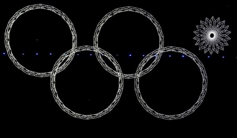 Four out of five Olympic rings are seen lit up during the opening ceremony of the 2014 Sochi Winter Olympics, February 7, 2014. (Reuters) Sochi Olympics