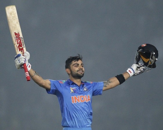 India skipper Virat Kohli celebrates reaching his century in the Asia Cup 2014 match against Bangladesh, 26 February. Reuters Virat Kohli India