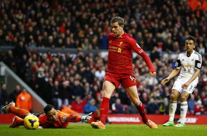 Liverpool midfielder Jordan Henderson scores against Swansea in their English Premier League game, 23 February. Reuters Henderson Liverpool Vorm Swansea