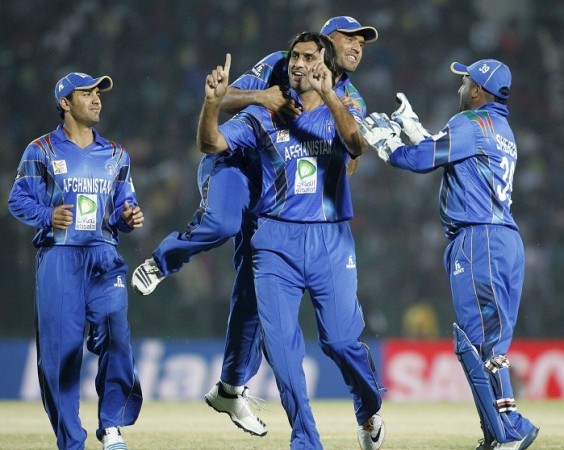 Not to indulge in the 'attan' yet, Afghanistan players celebrate a Bangladesh wicket, 1 March. Reuters. Asia Cup 2014