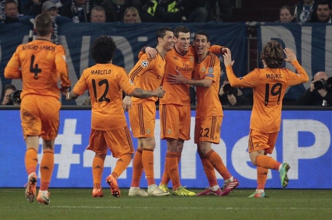 Real Madrid players celebrate a goal against Schalke in the Champions League, 26 February. Real Madrid Ronaldo Bale Di Maria
