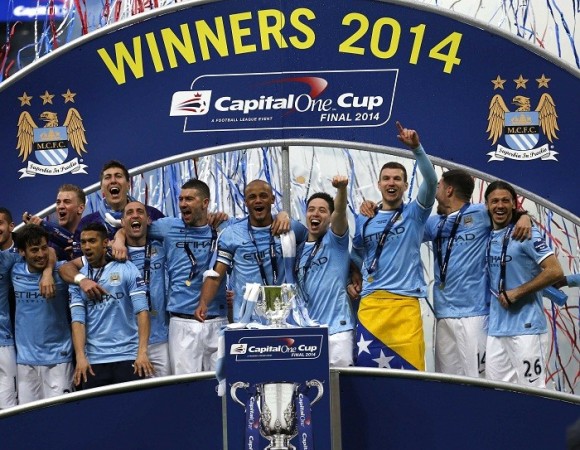 Manchester City players celebrate after defeating Sunderland in the League Cup final, 2 March. Reuters Manchester City Capital One Cup