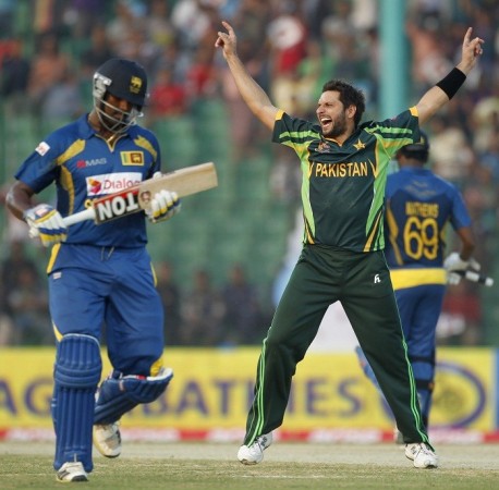 Pakistan all-rounder Shahid Afridi celebrates the wicket of Thisara Perera in their Asia Cup 2014 game, 25 February. Reuters Pakistan Afridi Sri Lanka Perera