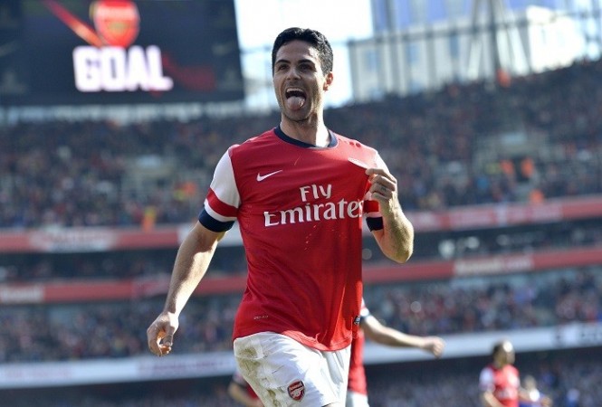 Arsenal midfielder Mikle Arteta celebrates his goal against former club Everton, 8 March. Reuters Mikel Arteta Arsenal
