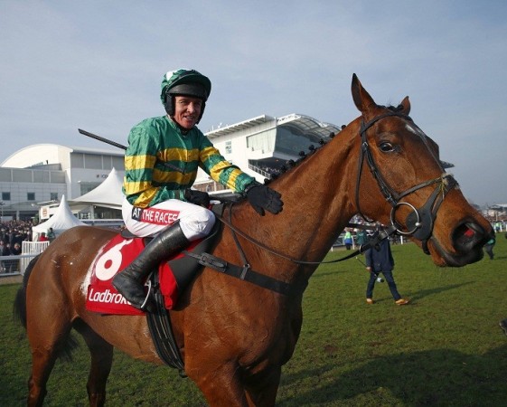 Barry Geraghty celebrates after guiding More Of That to World Hurdle victory at the Cheltenham Festival, 13 March. Reuters Barry Geraghty More Of That Cheltenham Horse Racing