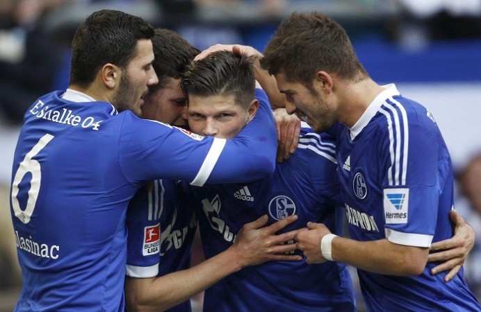 Schalke players celebrate Klaas Jan Huntelaar's goal against Hoffenheim in the Bundesliga, 8 March. Schalke Huntelaar