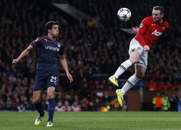 The onus will be on Wayne Rooney to shine in the absence of the injured Robin Van Persie for Manchester United. Reuters Wayne Rooney Manchester United Olympiakos Marcano