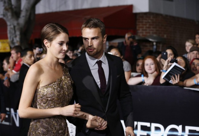 Shailene Woodley and Theo James attend the premiere of "Divergent" in Los Angeles