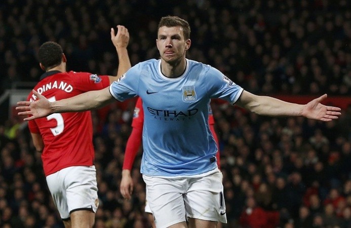 Manchester City striker Edin Dzeko celebrates after scoring against Manchester United in the English Premier League, 25 March. Reuters Edin Dzeko Manchester City