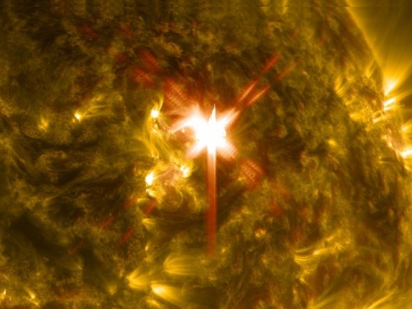 Extreme ultraviolet light streams out of an X-class solar flare as seen in this image captured on March 29, 2014, by NASA's Solar Dynamics Observatory.