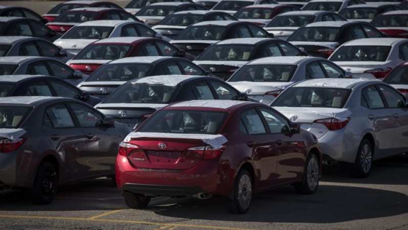 New cars are seen at the Toyota plant in Cambridge