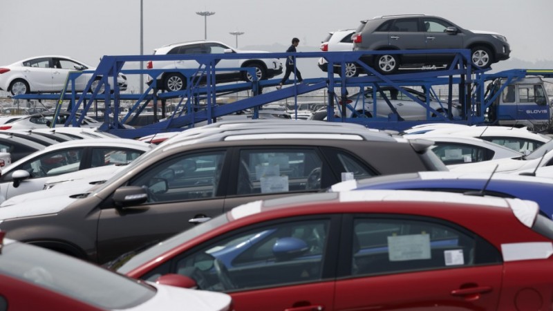 File photo of cars made by South Korea's Hyundai Motor Group on a truck at the company's shipping yard at a port in Pyeongtaek