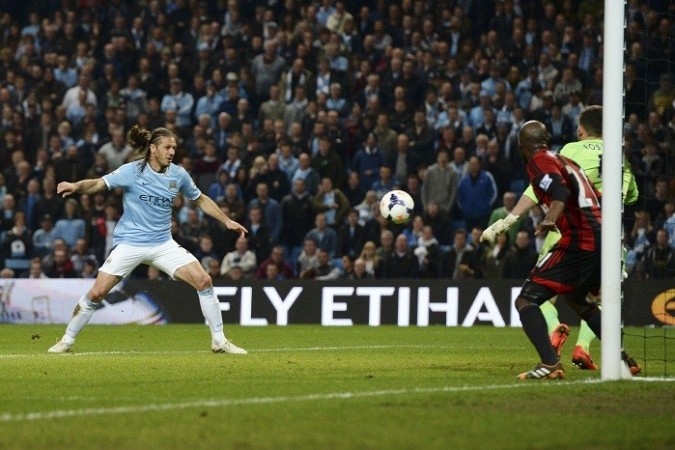 Manchester City defender Martin Demichelis scores against West Brom in their English Premier League game, 21 April. Reuters Martin Demichelis Manchester City West Brom