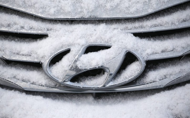 File photo of a logo of Hyundai Motor on a sedan covered with snow at a shipping yard in Pyeongtaek