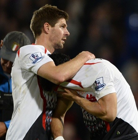 Liverpool skipper Steven Gerrard tries to console Luis Suarez after the 3-3 draw against Crystal Palace, 5 May. Reuters Steven Gerrard Luis Suarez Liverpool