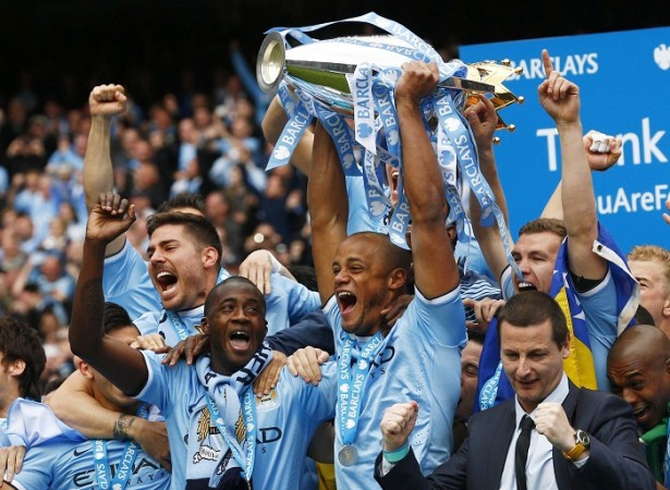 Manchester City captain Vincent Kompany celebrates after winning the English Premier League title. Vincent Kompany