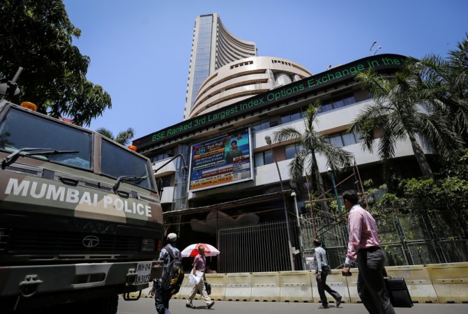 People walk past the Bombay Stock Exchange (BSE) building in Mumbai (Reuters)
