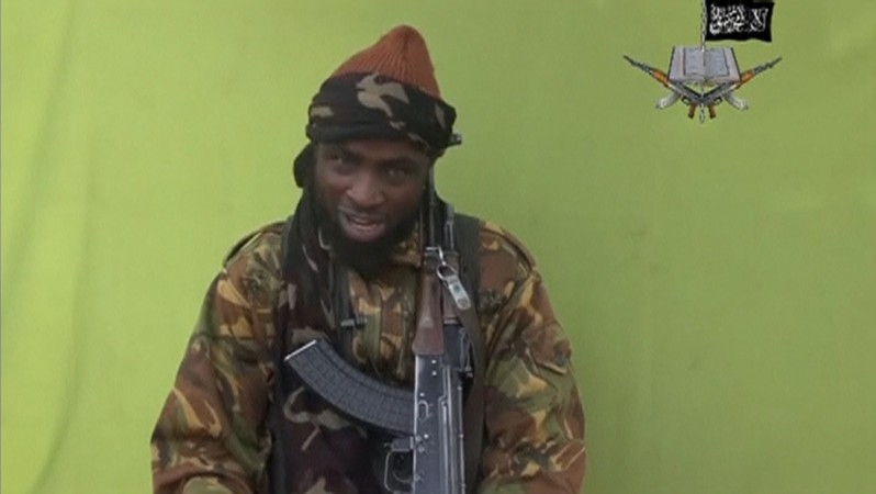 Boko Haram leader Abubakar Shekau speaks at an unknown location in this still taken from an undated video released by the outfit.