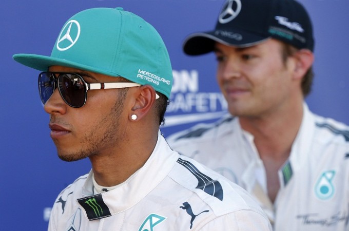Lewis Hamilton and Nico Rosberg leave the pits in the Monaco GP. Hamilton and Rosberg