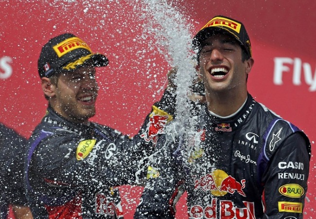 Sebastian Vettel sprays champagne at teammate Daniel Ricciardo after the Canadian GP. Daniel Ricciardo Canadian GP