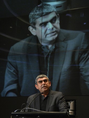 Infosys' CEO Sikka speaks during a news conference at company's headquarters in Bangalore