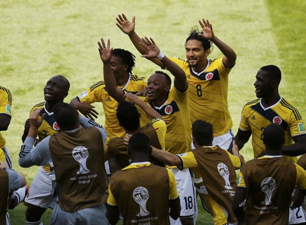 Pablo Armero celebrates with his teammates after scoring against Greece, 14 June Pablo Armero Colombia