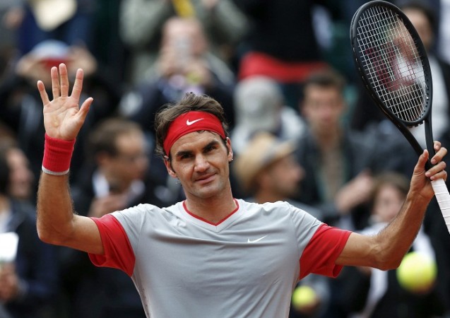 Roger Federer acknowledges crowd during French Open. Roger Federer