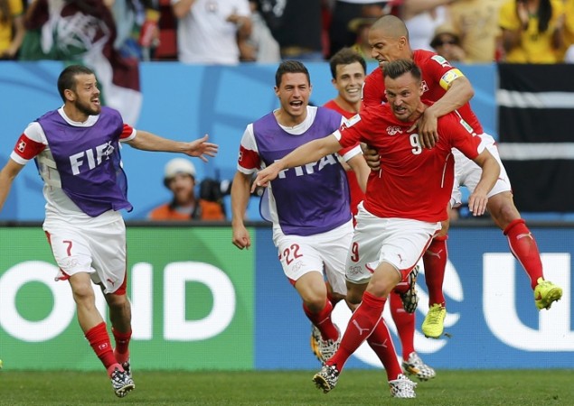 Switzerland striker Haris Seferovic celebrates with his teammates after scoring the winner against Ecuador, 15 June Haris Seferovic Switzerland
