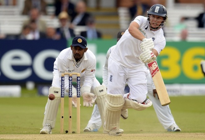 England's Gary Ballance hits out watched by Sri Lanka's Prasanna Jayawardene. Gary Ballance